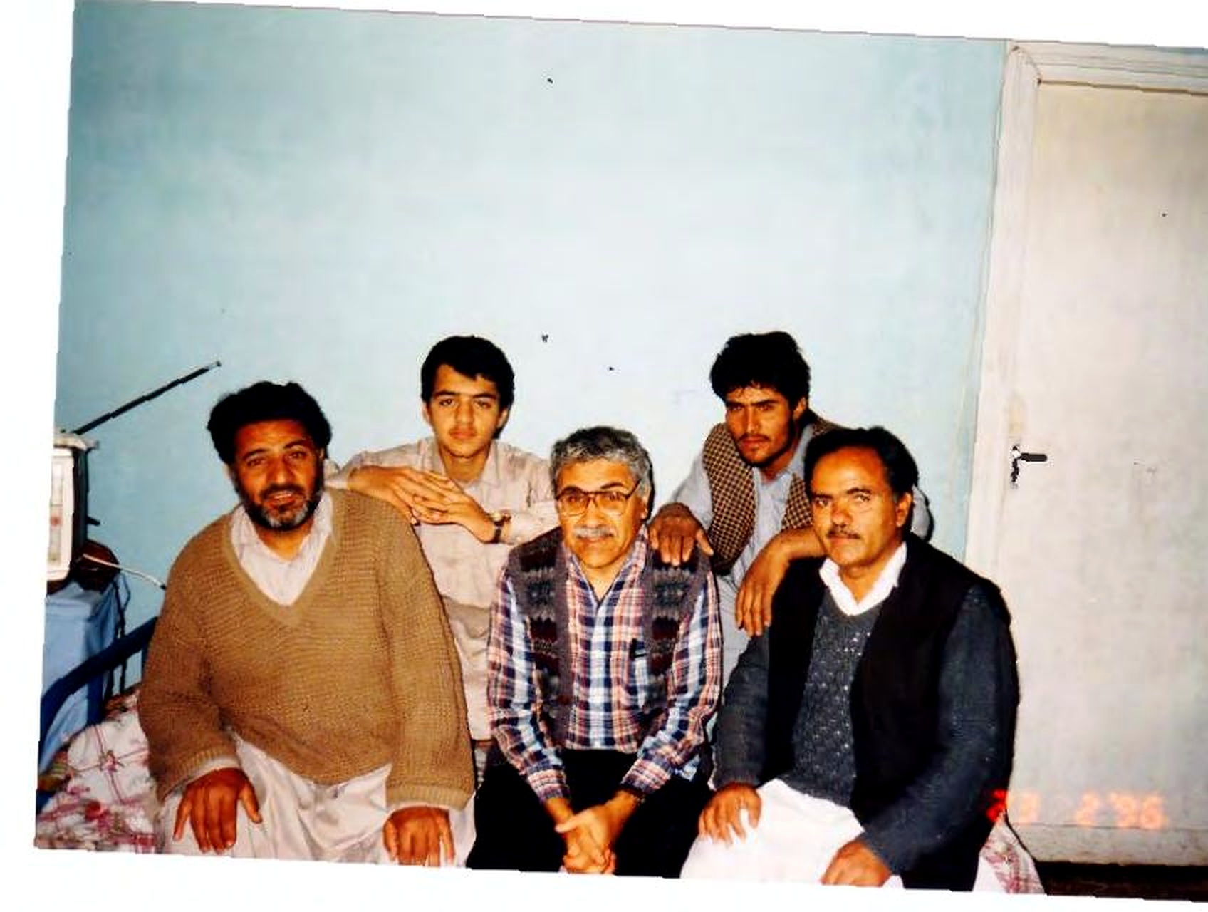 Qayum Safi with his brothers, a friend, and their sons
