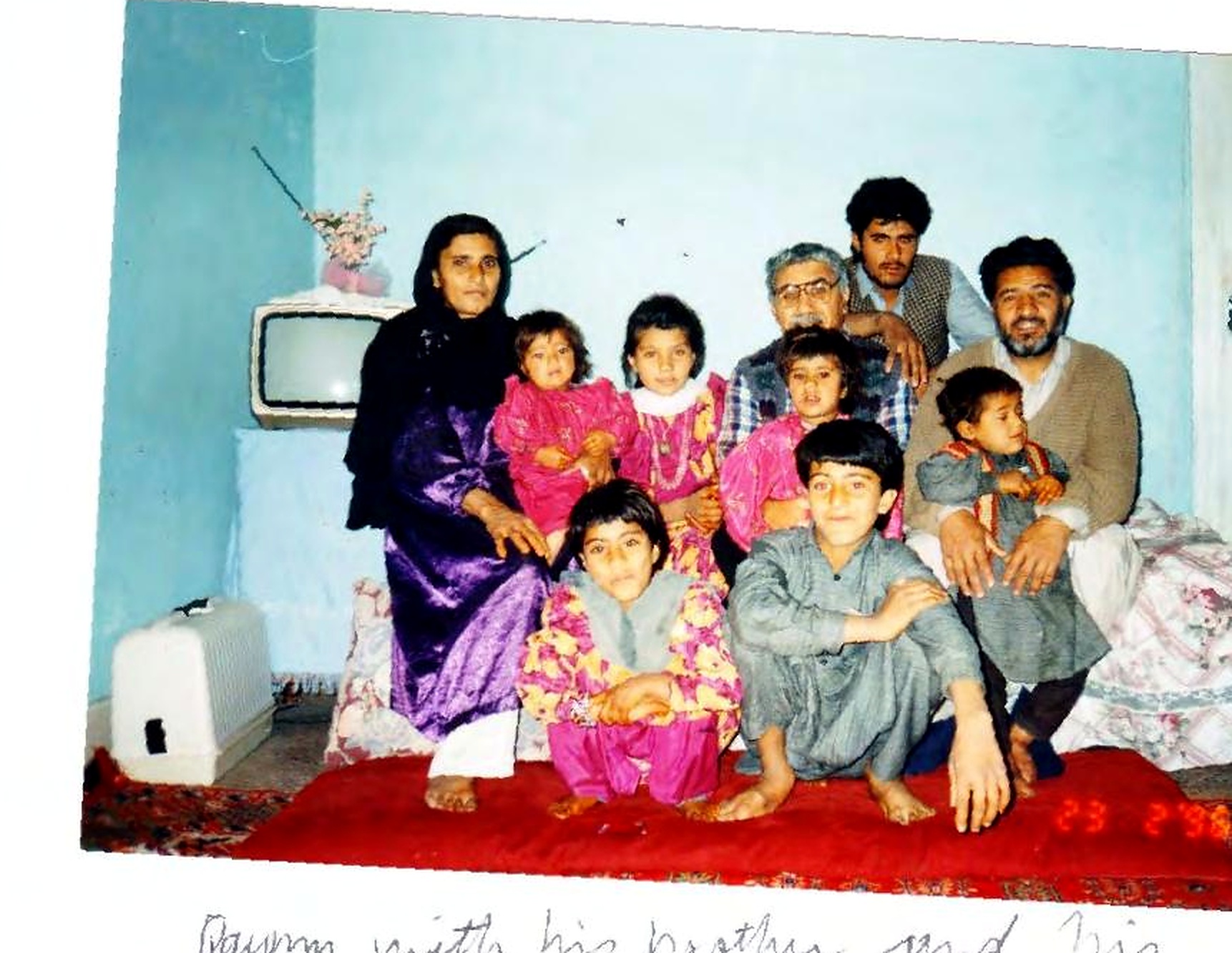 Qayum Safi with his brother and extended family
