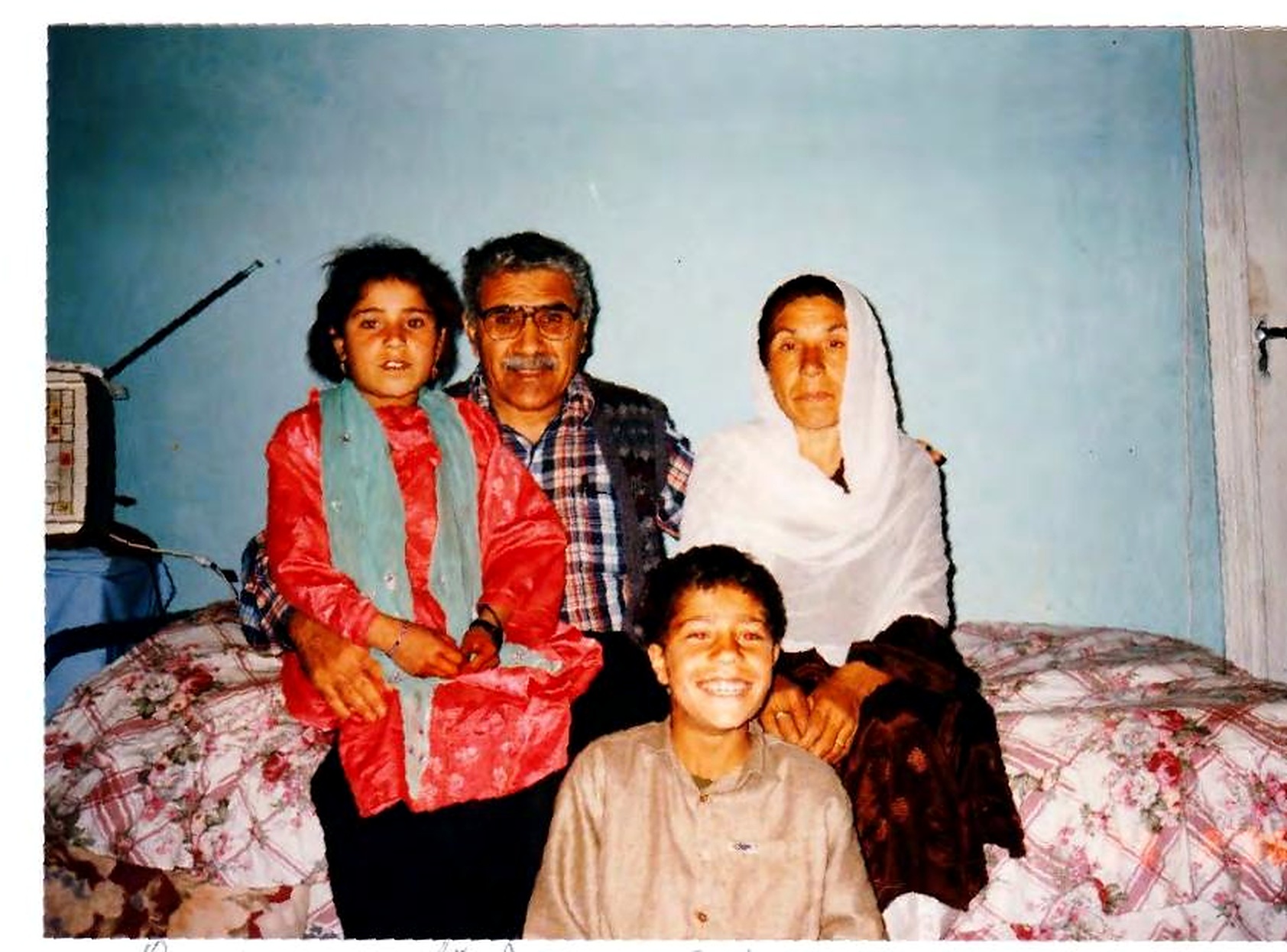 Qayum Safi with his sister and her children