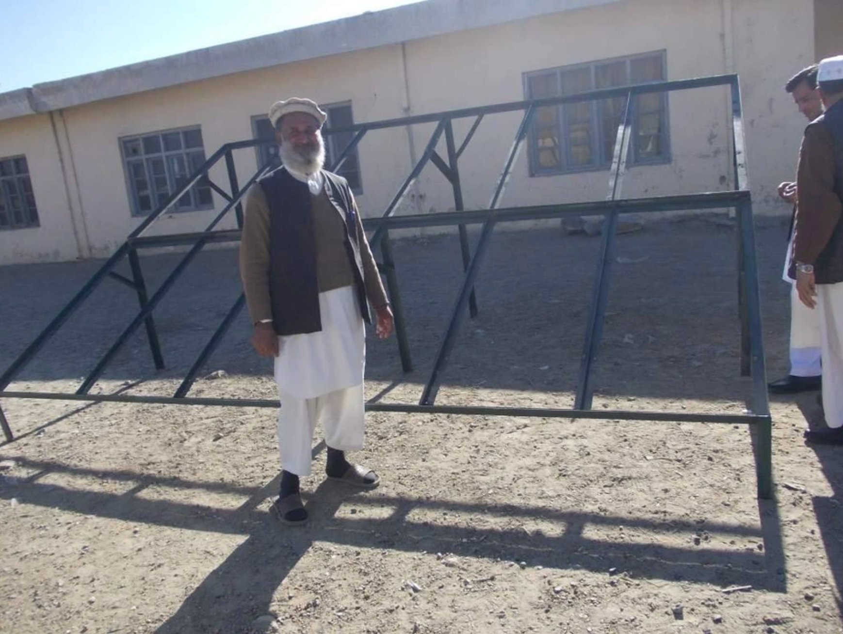 Solar panel frame being installed at school in Khas Kunar
